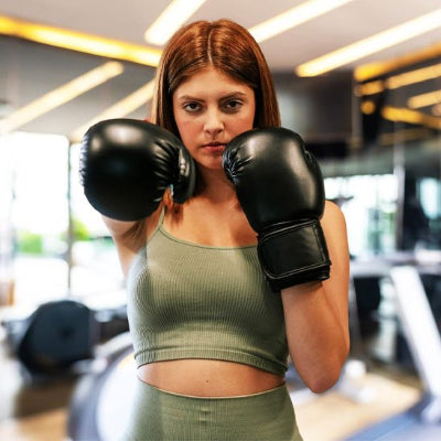 Gants de boxe femme droite face gauche repliée