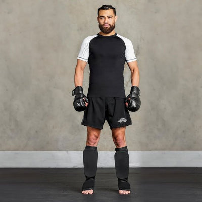 Protege tibia boxe pied cheville boxeur en gants