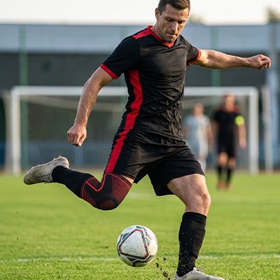 Genouillere pour le sport​ profil homme ballon foot